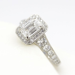 emerald-cut-diamond-halo-engagement-ring-with-bead-set-diamond-band-600x600