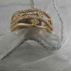 Yellow gold and diamond ring